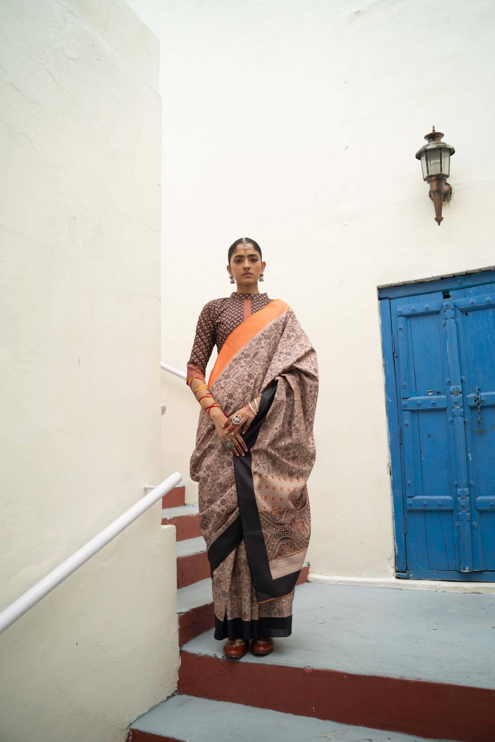 Orange And Black Border Printed Mikora Silk Saree