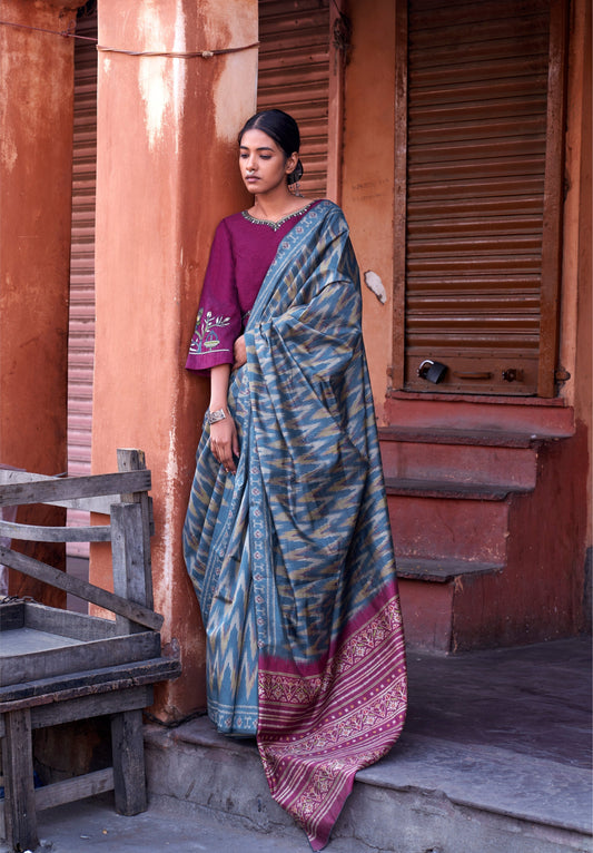 Turquoise Ikkat Print Saree With Embroidered Blouse Piece