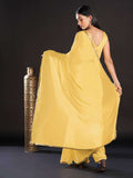 Georgette Yellow Solid And Embellished Designer Saree With Blouse Piece