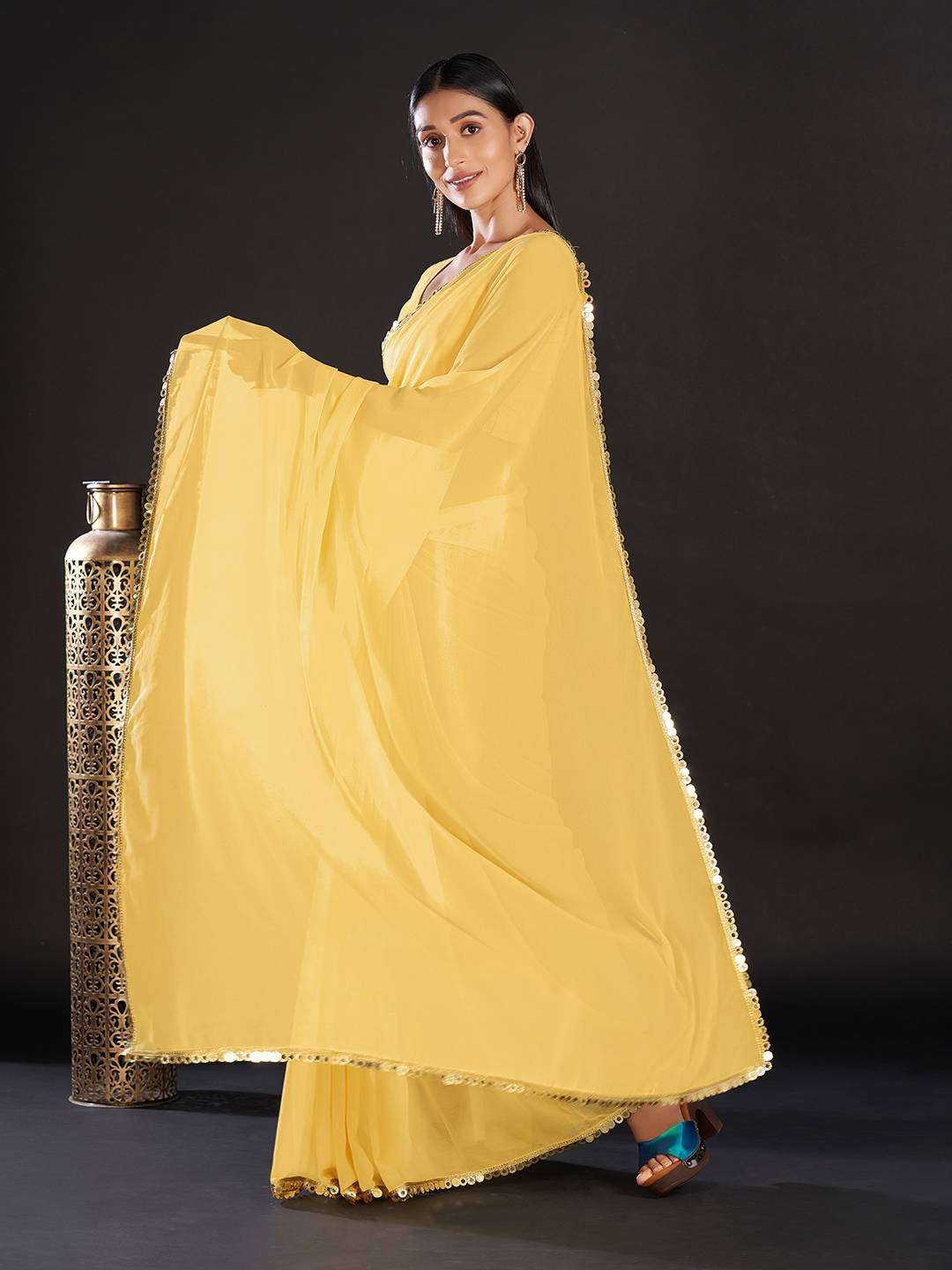 Georgette Yellow Solid And Embellished Designer Saree With Blouse Piece