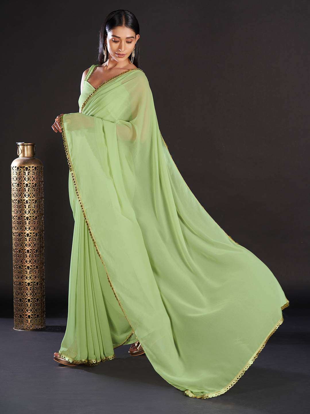 Georgette Green Solid And Embellished Designer Saree With Blouse Piece