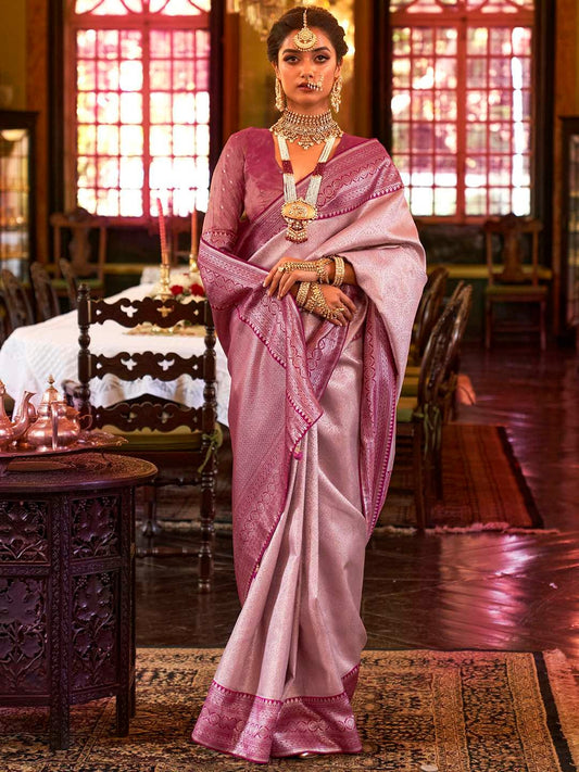 Elegant Mauve Kanjivaram Banarasi silk saree with Zari woven design for women includes an unstitched blouse piece.